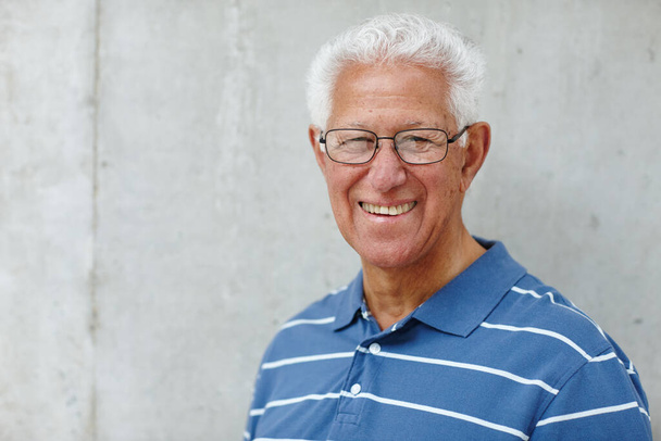 Confidence is the key. Portrait of a senior man smiling at the camera - Photo, Image