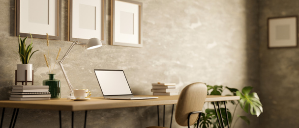 Moderní stylový podkrovní design interiéru s laptopem na bílém plátně a příslušenstvím na dřevěném stole, židli, interiéru a rámem na betonové podkrovní stěně.3D vykreslování, 3D ilustrace - Fotografie, Obrázek