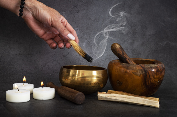 palo santo and mortars in front of dark background - 写真・画像