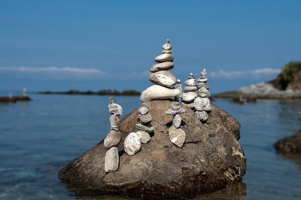 balanced stones on the rocks of the se - Photo, Image