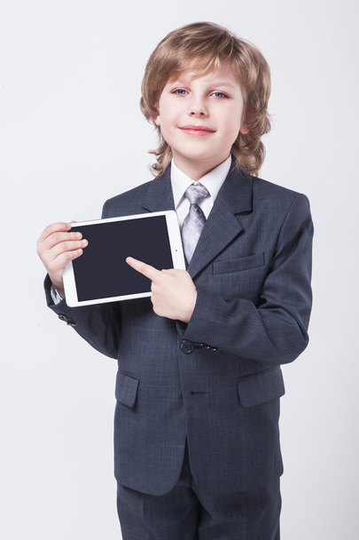 young successful businessman with a tablet in hands - Foto, afbeelding