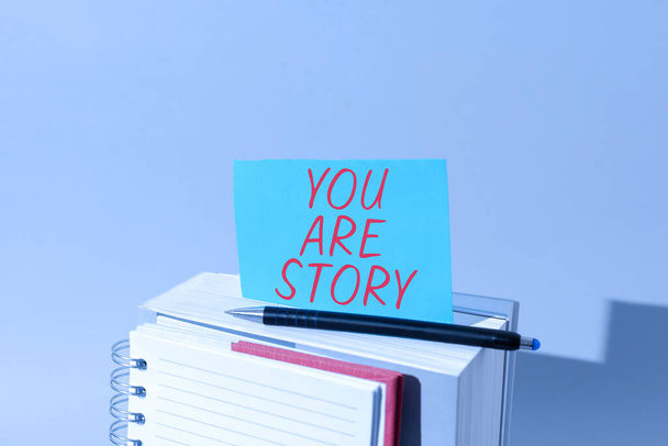 Señal que muestra Usted es historia, Visión general del negocio Sus historias cuentan y valen la pena contarles a todos - Foto, Imagen