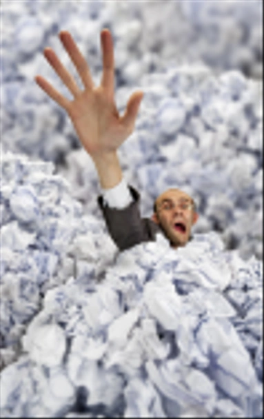Businessman sinking in big heap of crumpled papers - Photo, Image