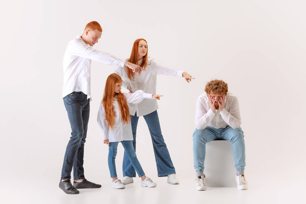 Diversity. Two men and woman and kid, red-headed young people wearing casual style clothes. Society, social issues, human rights, art, fashion, emotions, style. - Фото, изображение