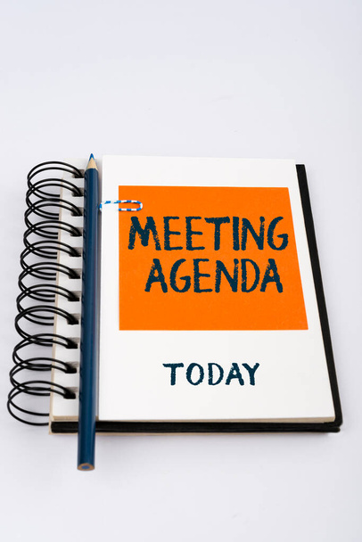 Handschriftliche Unterschrift Meeting AgendaEine Agenda setzt klare Erwartungen für das, was zu einem Meeting gehört, Konzept bedeutet Eine Agenda setzt klare Erwartungen für das, was zu einem Meeting gehört - Foto, Bild