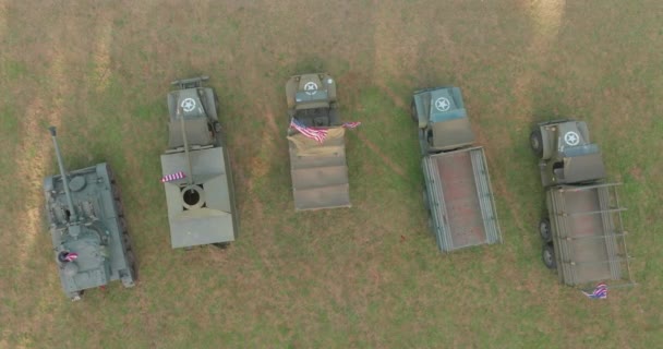 Aerial view. Convoy of old American military vehicles. Exhibition of old USA army weapons and equipment. Top view. High quality 4k footage - Footage, Video