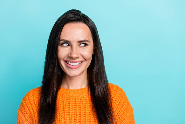 Photo of cheerful gorgeous person beaming smile look interested empty space isolated on turquoise color background. - Zdjęcie, obraz