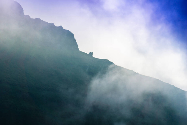 Fog and mist over mountain rige, Iceland - HDR photograph - Photo, Image