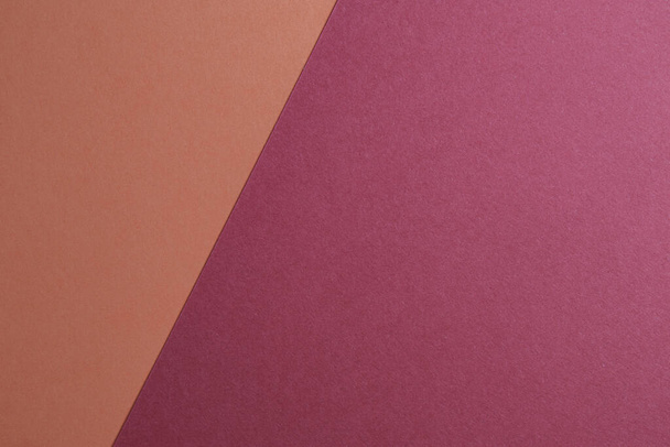 Kağıttan yapılmış turuncu ve mor renkli bir arka plan. İki renkli kağıt dokusu arkaplanı - Fotoğraf, Görsel