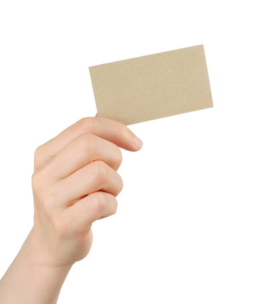 Hand holds blank business card on white background close-up - Photo, Image