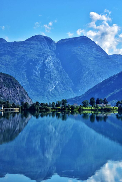 Amazing mountains landscape with clear calm lake - Fotó, kép