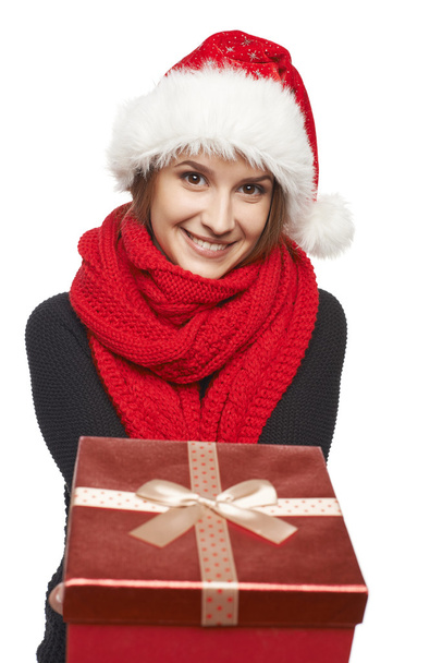 Santa woman giving gift box - Фото, изображение