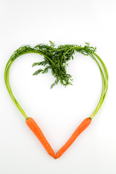 fresh carrots in heart shape - Foto, imagen
