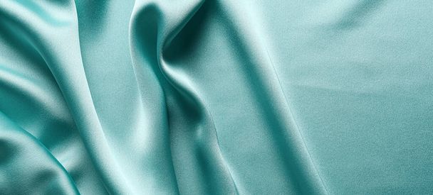Texture of turquoise fabric as background, top view - Photo, Image