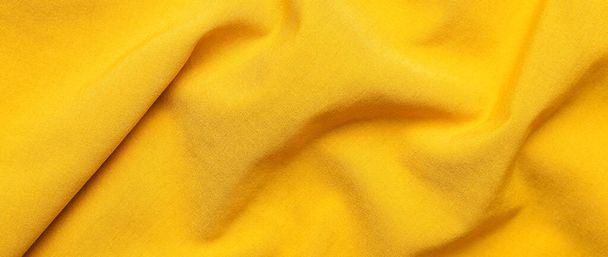 Текстура жовтого тканини як фон, вид зверху
 - Фото, зображення