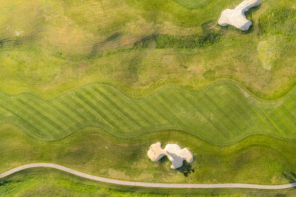 Aerial view of a beautiful green golf course - Fotó, kép