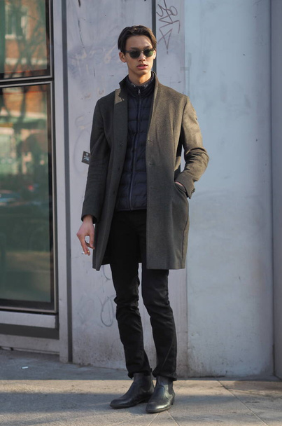 Fashion blogger street style outfit before Emporio Armani fashion show during Milano Fashion week  fall/winter man collections - Photo, Image