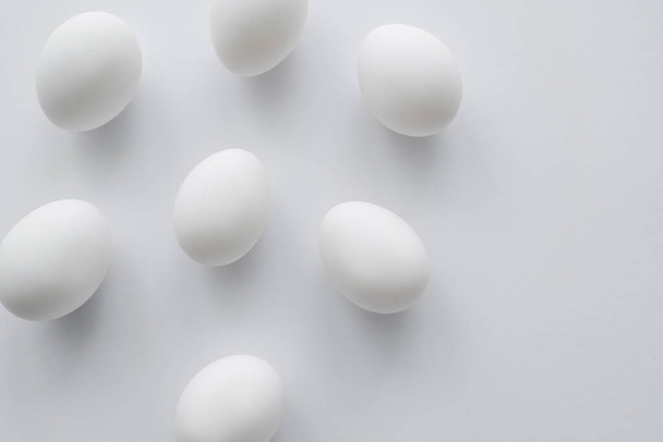 Top view of natural chicken eggs on white background  - Photo, Image