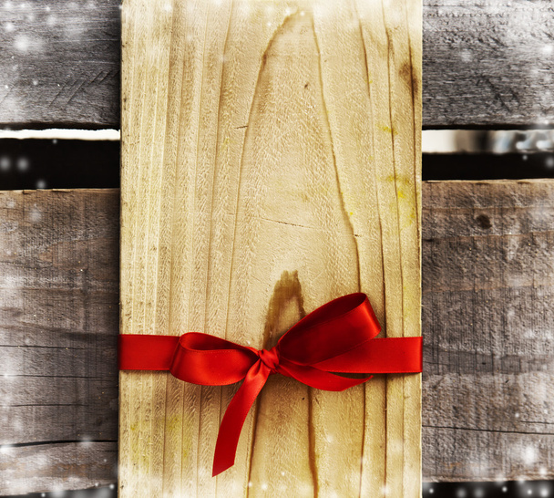Red Bow on wooden Gift - Foto, afbeelding
