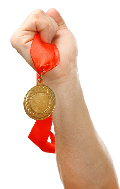 Golden medal in hand - Foto, Imagen