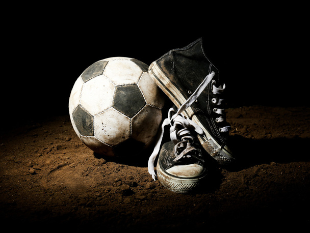 Soccer ball on ground - Fotoğraf, Görsel
