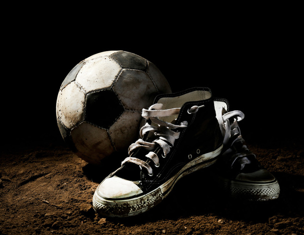 Soccer ball on ground - 写真・画像