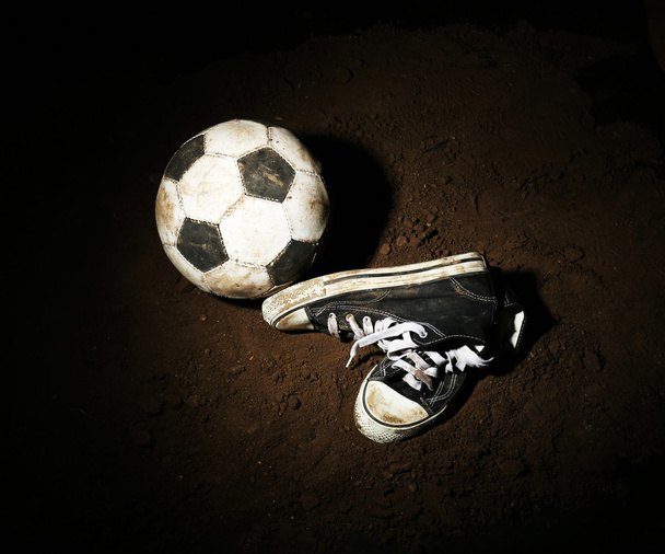 Soccer ball on ground - Fotoğraf, Görsel