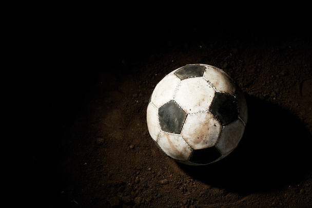 Soccer ball on ground - Фото, изображение