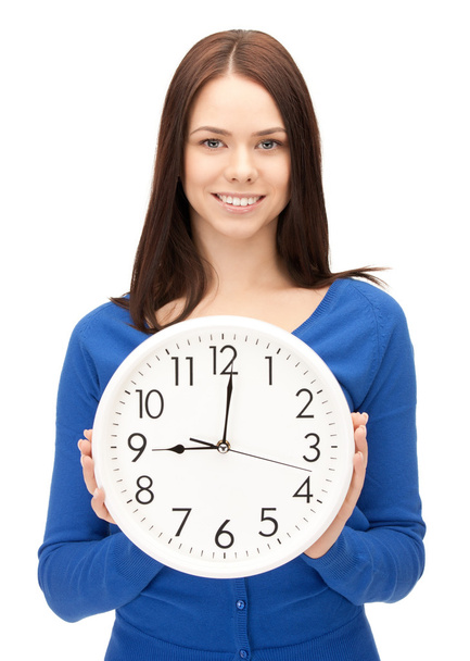 Woman holding big clock - Foto, imagen