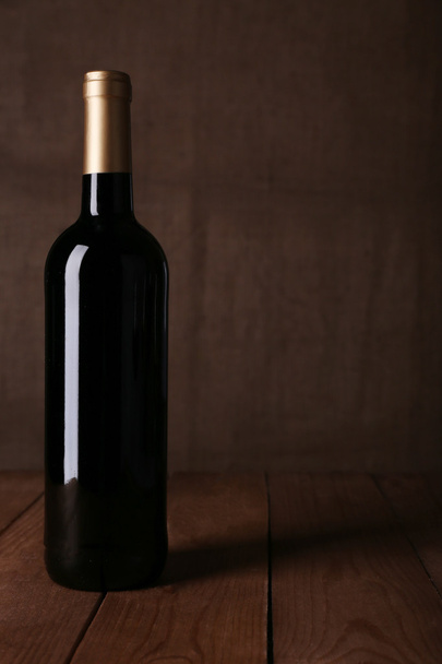 Bottle of red wine - Фото, зображення