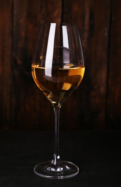 Wineglass with white wine - Фото, зображення
