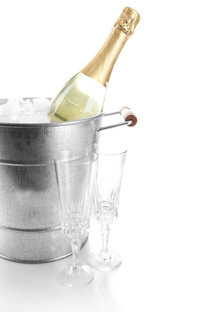 Bottle of champagne in bucket - Foto, afbeelding