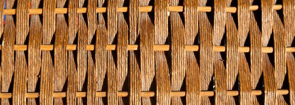 Rattan obdélníkový proutěný textura s ručně vyráběné tradiční a suché větve, proutěné hnědé textury pozadí, přírodní vzor tkané proutí - Fotografie, Obrázek
