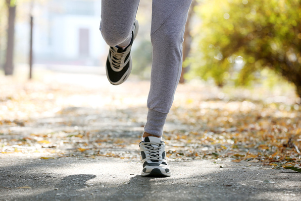 Young man jogging - Фото, изображение