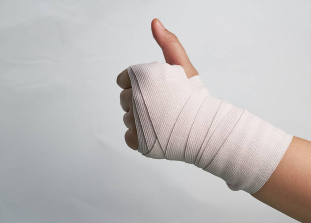 elastic bandage roll support hand wrist and finger isolated on white - Photo, Image