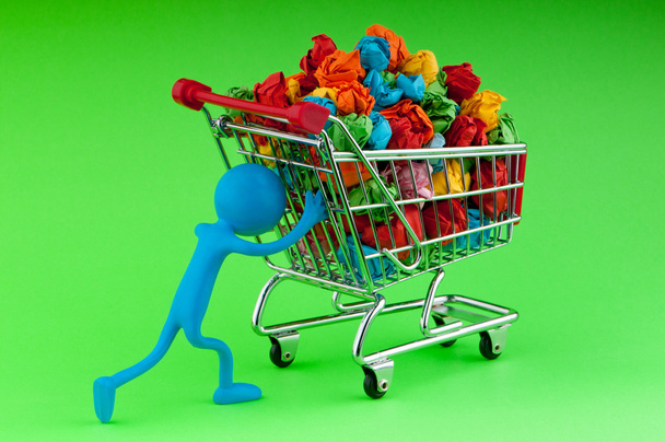 Recylcing concept with color paper and shopping cart - Foto, Imagem