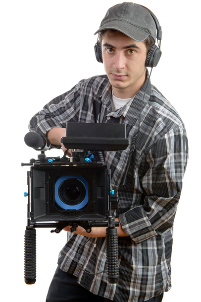 young cameraman and professional camera - Photo, Image