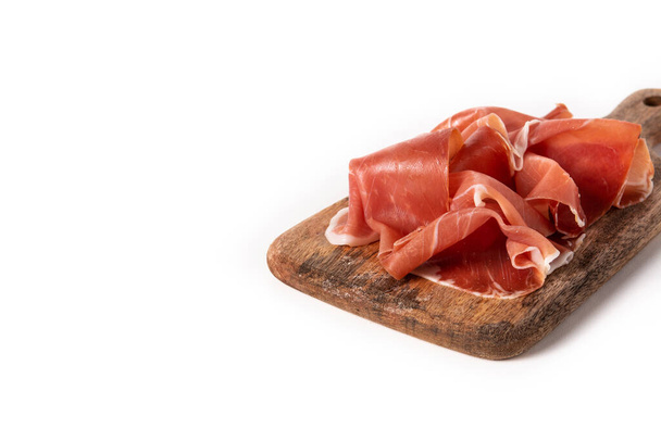 Spanish serrano ham with olives and breadstick isolated on white background. Copy space - Photo, Image