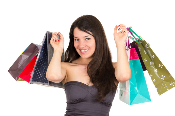 beautiful young brunette smiling woman shopping holding bags - Fotografie, Obrázek