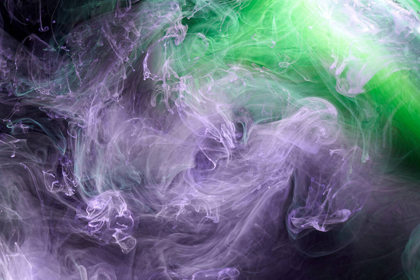 Green purple smoke abstract background, acrylic paint underwater explosion - Foto, Imagen