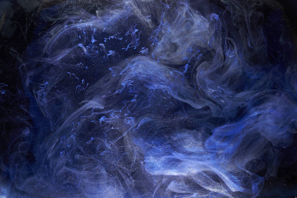 Liquid fluid art abstract background. Blue acrylic paint underwater, galactic smoke ocean - Foto, afbeelding