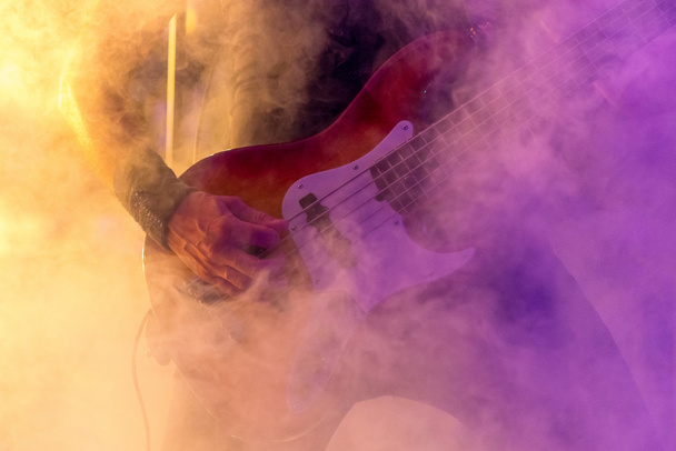 Bass guitar closeup with emotional atmosphere - Фото, зображення