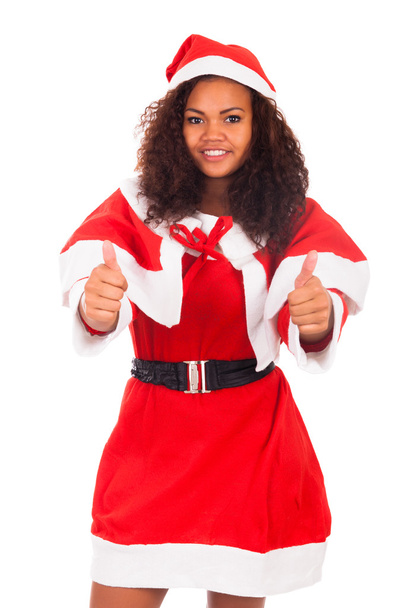 Christmas woman doing a thumbs up gesture against a white backgr - Φωτογραφία, εικόνα