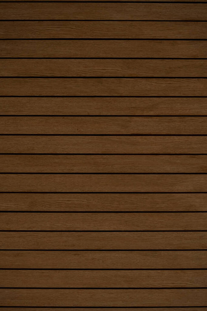 Arranged pattern  brown wooden planks board background makes you feel warm and natural. - Photo, Image