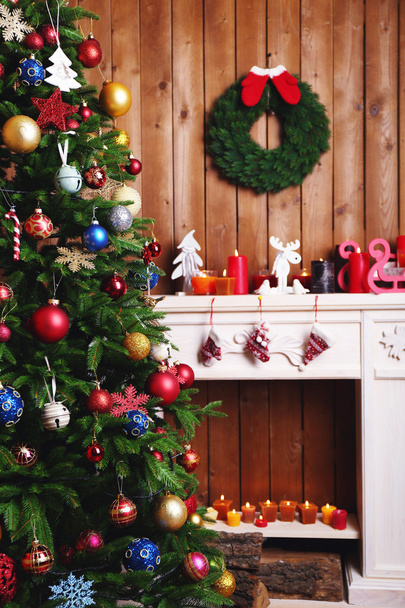 Fireplace with Christmas decorations - Фото, зображення