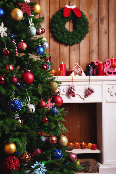 Fireplace with Christmas decorations - Фото, изображение