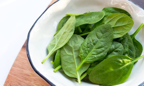 Spinach leaves. Extremely nutrient-rich vegetable - Foto, imagen