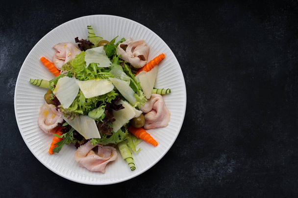 Sous vide turkey salad with vegetables and olive dressing - Photo, Image