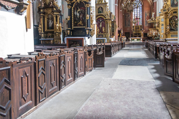 Torun Poland, May 09, 2022: Interior of the Cathedral of St. John the Baptist and John the Evangelist in Torun. Additional decoration on the occasion of First Holy Communion. - Photo, Image