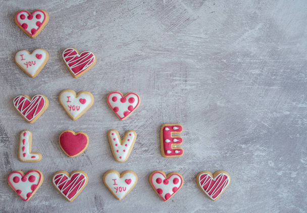 Assortment of Heart Shaped Valentine Cookies saying I Love You on a Rustic Table Top with Copy Space - Фото, зображення